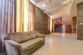 Fabhotel Gold Galaxy