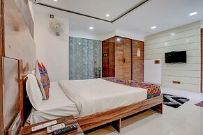 Fabhotel Vardhan House