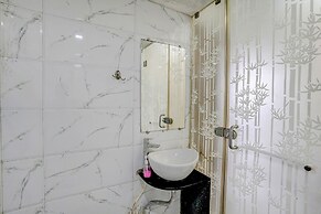 Fabhotel Vardhan House