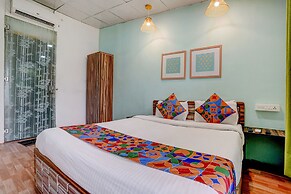 Fabhotel Vardhan House