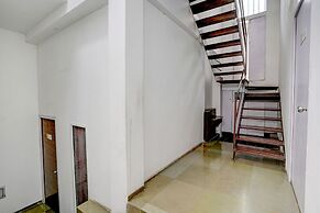 Fabhotel Vardhan House