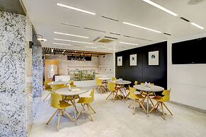 Fabhotel Prime Oasis Blue