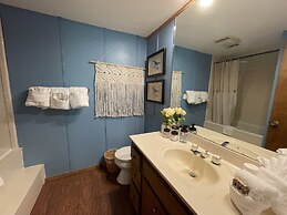 Forest view, log-sided two bedroom, two bath condo on Lake Ouachita. 2