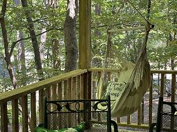 Forest view, log-sided two bedroom, two bath condo on Lake Ouachita. 2