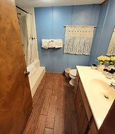 Forest view, log-sided two bedroom, two bath condo on Lake Ouachita. 2