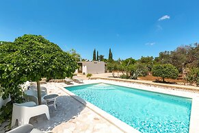 3229 Trullo Mimosa by Perle di Puglia