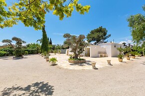 3229 Trullo Mimosa by Perle di Puglia
