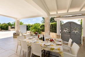 3229 Trullo Mimosa by Perle di Puglia