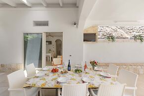 3229 Trullo Mimosa by Perle di Puglia