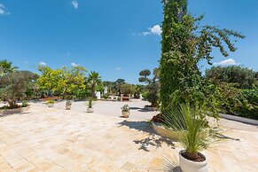 3229 Trullo Mimosa by Perle di Puglia