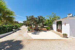 3229 Trullo Mimosa by Perle di Puglia