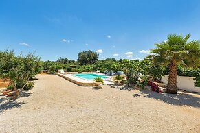 3229 Trullo Mimosa by Perle di Puglia