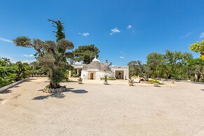 3229 Trullo Mimosa by Perle di Puglia