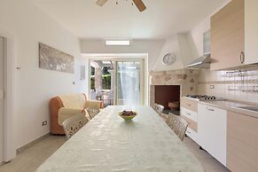 3229 Trullo Mimosa by Perle di Puglia