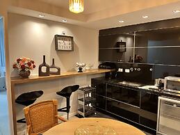 Center Suíço Flats e Shopping