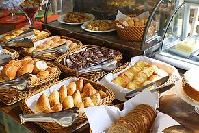 Center Suíço Flats e Shopping