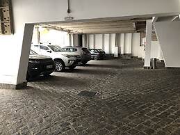 Center Suíço Flats e Shopping