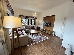 Center Suíço Flats e Shopping