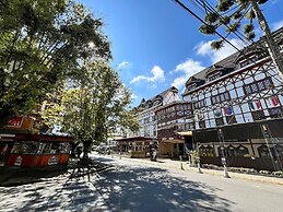 Center Suíço Flats e Shopping