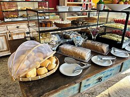 Center Suíço Flats e Shopping