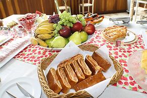 Center Suíço Flats e Shopping