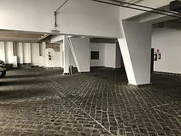 Center Suíço Flats e Shopping