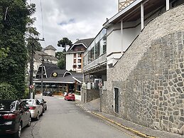 Center Suíço Flats e Shopping