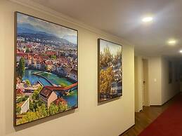 Center Suíço Flats e Shopping