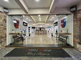 Center Suíço Flats e Shopping