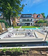 Luxus Neubau 170m2 Loft mit Pool Garten