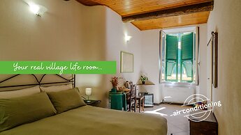 Macaia Village Life Rooms with AC