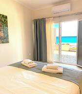 Beachfront 4-bed Luxury Suite - Agios Gordios Corfu Greece