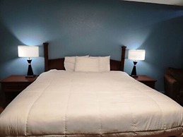 Executive Inn By OYO Queenville Mena