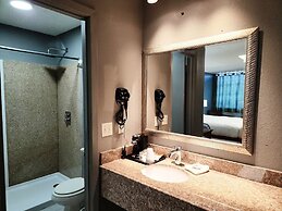 Executive Inn By OYO Queenville Mena