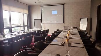 Capital O 950 Acqua Novotel Tower