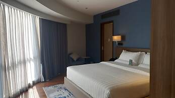 Capital O 950 Acqua Novotel Tower