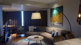 Capital O 950 Acqua Novotel Tower