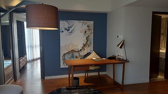 Capital O 950 Acqua Novotel Tower