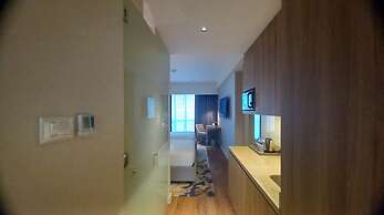 Capital O 950 Acqua Novotel Tower