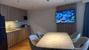 Capital O 950 Acqua Novotel Tower