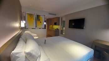 Capital O 950 Acqua Novotel Tower