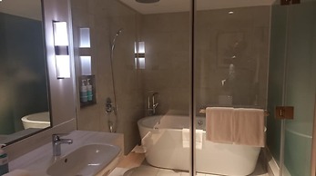 Capital O 950 Acqua Novotel Tower