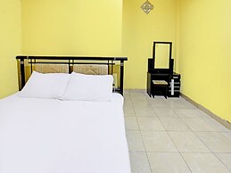 SPOT ON 92420 Kos Agi Mataram Near Masjid Hissoh Al-Faham