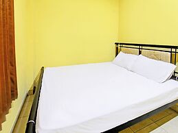 SPOT ON 92420 Kos Agi Mataram Near Masjid Hissoh Al-Faham