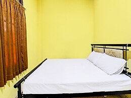 SPOT ON 92420 Kos Agi Mataram Near Masjid Hissoh Al-Faham