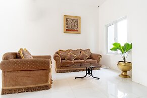 Capital O 92444 Kamojo Guest House