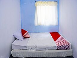 SPOT ON 91591 Rafika Homestay SyariahNearTempat Makan Pagi Sore Nohil