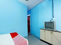 SPOT ON 91591 Rafika Homestay SyariahNearTempat Makan Pagi Sore Nohil