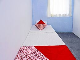 SPOT ON 91591 Rafika Homestay SyariahNearTempat Makan Pagi Sore Nohil