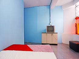 SPOT ON 91591 Rafika Homestay SyariahNearTempat Makan Pagi Sore Nohil